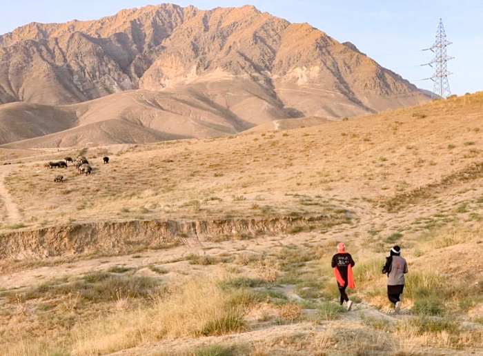 “It was so cool for me,” Rezaie (right) says of seeing women running around Kabul. “I really wanted to join them and to experience that.” So she did.